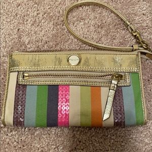 Coach multi colored striped wristlet